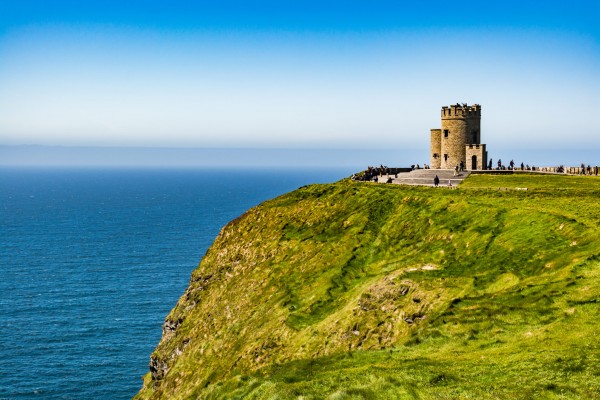 tower at the cliffs of moher, ireland, on a sunny day