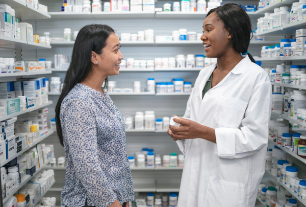 pharmacist talking to a customer