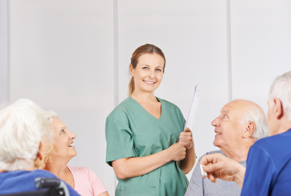 Nurse surrounded by patients