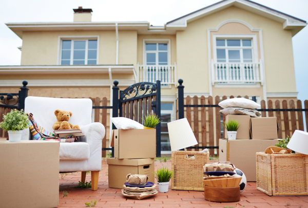 House with cardboard boxes outside