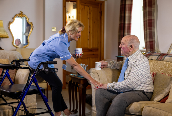 Nurse looking after an elderly patient