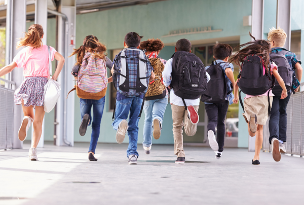 Children running at school